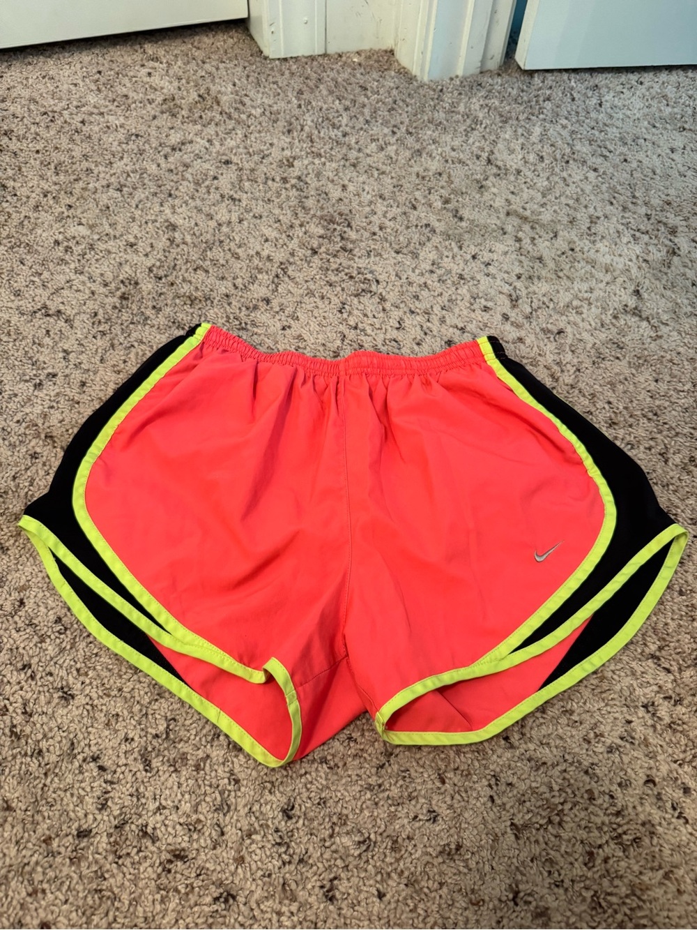 Nike Women’s Coral Athletic Shorts with Black Panels and Neon Yellow Trim